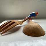 POLLY WANT A SALAD TOSSER?