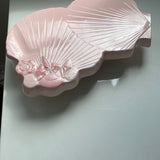 ANTIQUE SHELL TRIVET